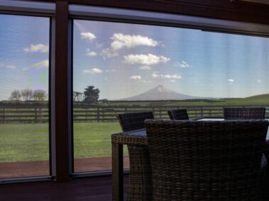 Ziptrak mesh screen with amazing views to Mt Taranaki - by Canvas Lifestyle