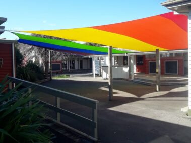 Multicoloured Z16 Fabricated Shade Sails in use in a school by Nelson Shade Solutions NZ