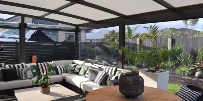 Outdoor space with patio and ziptrak blinds Outdoor space with patio and ziptrak blinds