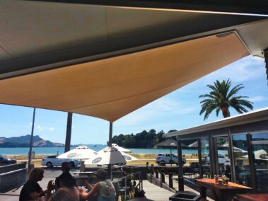 Stoked Café in Whitianga using E32 Shade Cloth, installed by Outdoors Covered