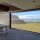 Two Ziptrak mesh blinds featuring a stunning view to the beach